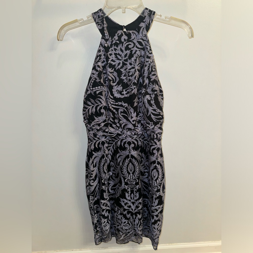 Black homecoming dress with sparkly blue/gray embroidered designs all over.